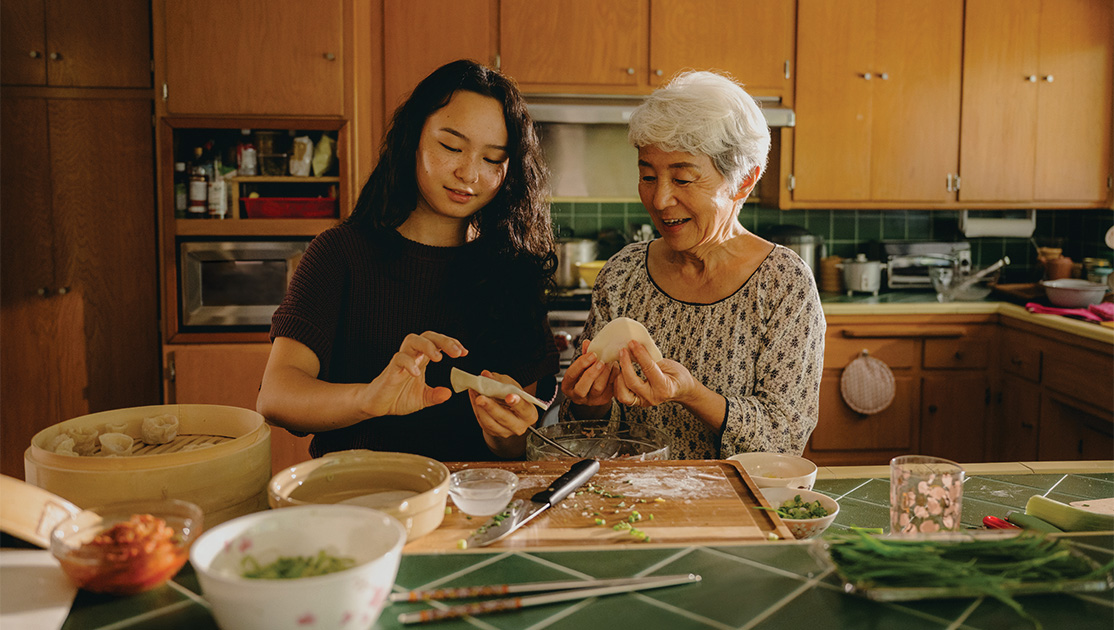 Generational women cooking together